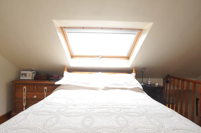 bed under window in loft conversion leeds 